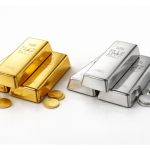 Gold and silver bars placed on a clean white surface representing daily precious metal price updates in India.